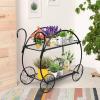 imageGRAFFY Metal Plant Stand 2 Tiered Garden Cart Shelf with 4 Decorative Wheels Parisian Style Flower Pot Holder Display Shelf for Home Patio Garden Flower Shop